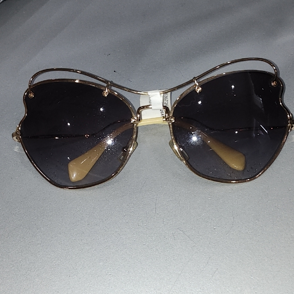 Mui Mui Gold Frame Sunglasses